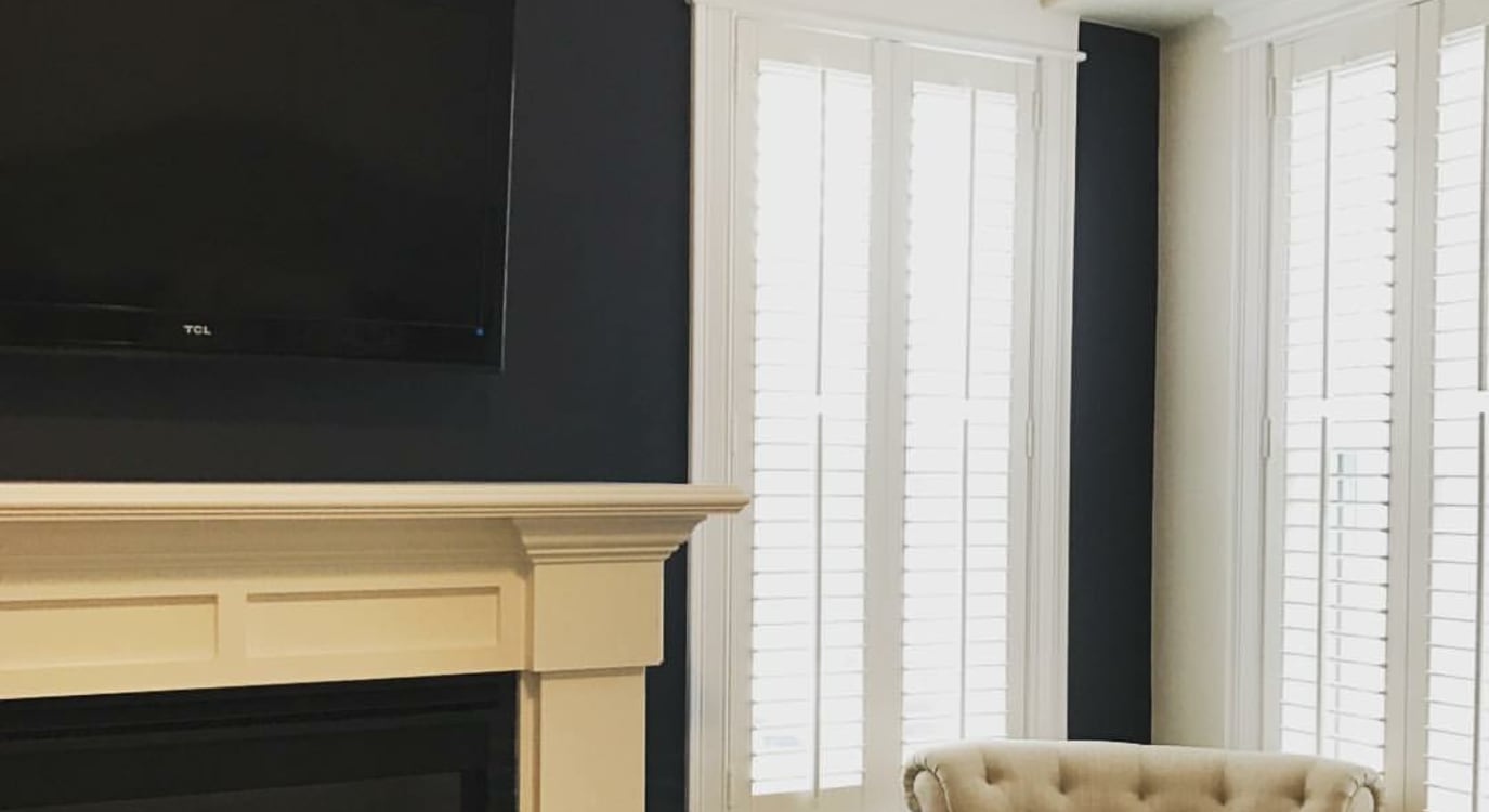 Plantation shutters in a sitting room